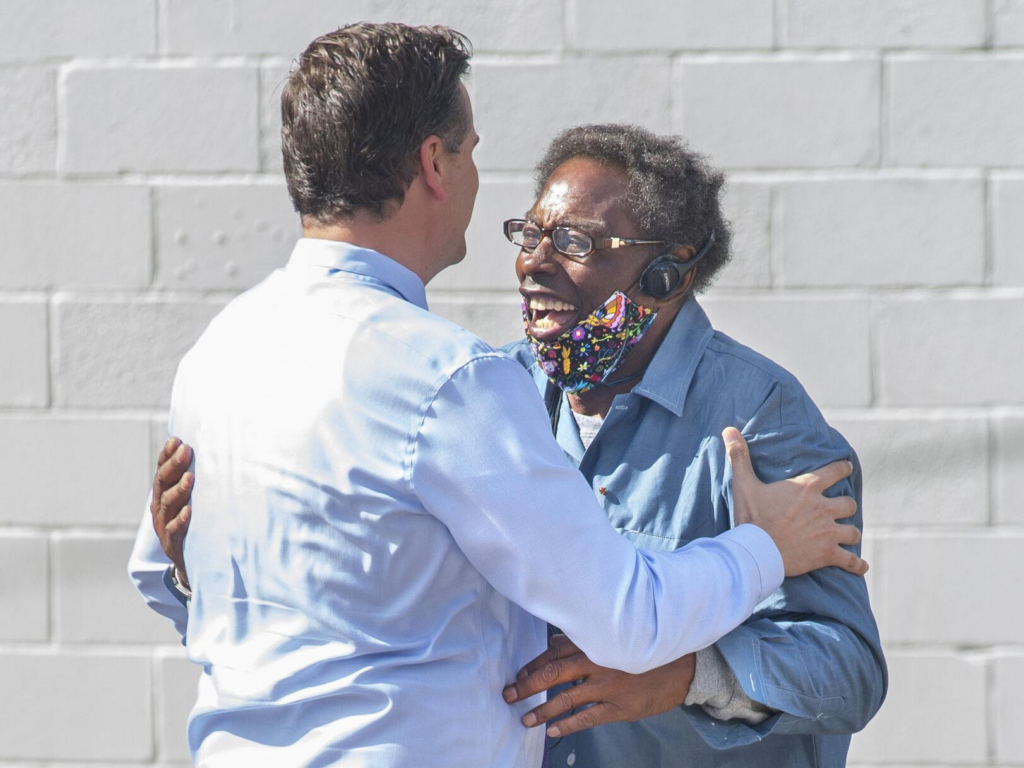 Parole Project executive director Andrew Hundley greets the man, Henry Montgomery, whose name bears the 2016 U.S. Supreme Court decision that provided a pathway for him and thousands of others nationwide sentenced to life without parole when they were children, as he walks out of the Louisiana State Penitentiary. Montgomery, who was granted parole on this third try, served 57 years and 9 months for a crime he committed when he was 17.